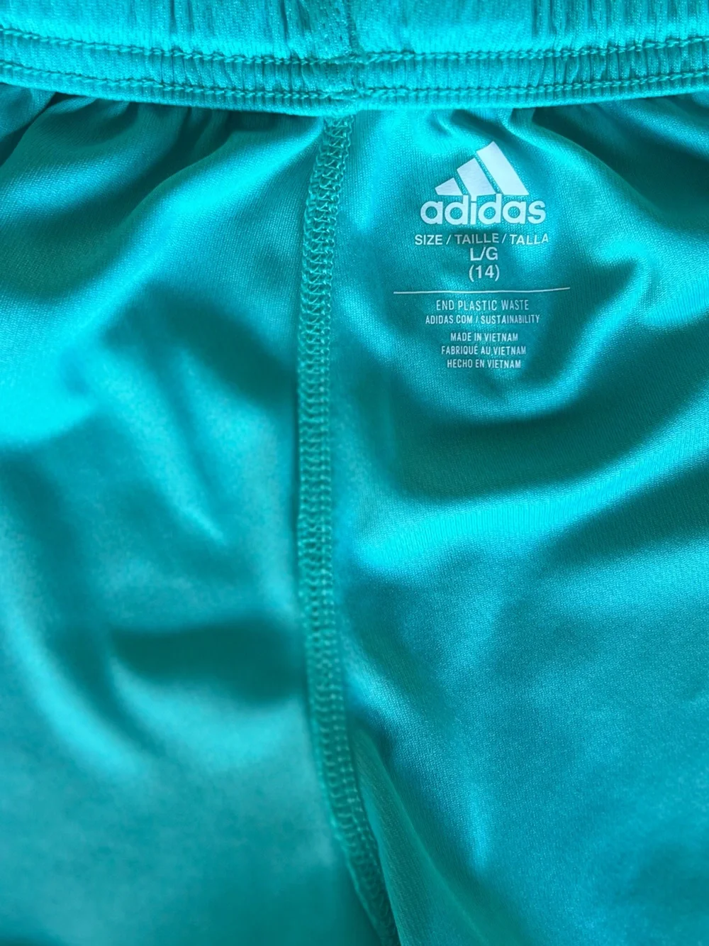 Girls Outfit: Aqua Adidas Shorts and Pink In Motion Top